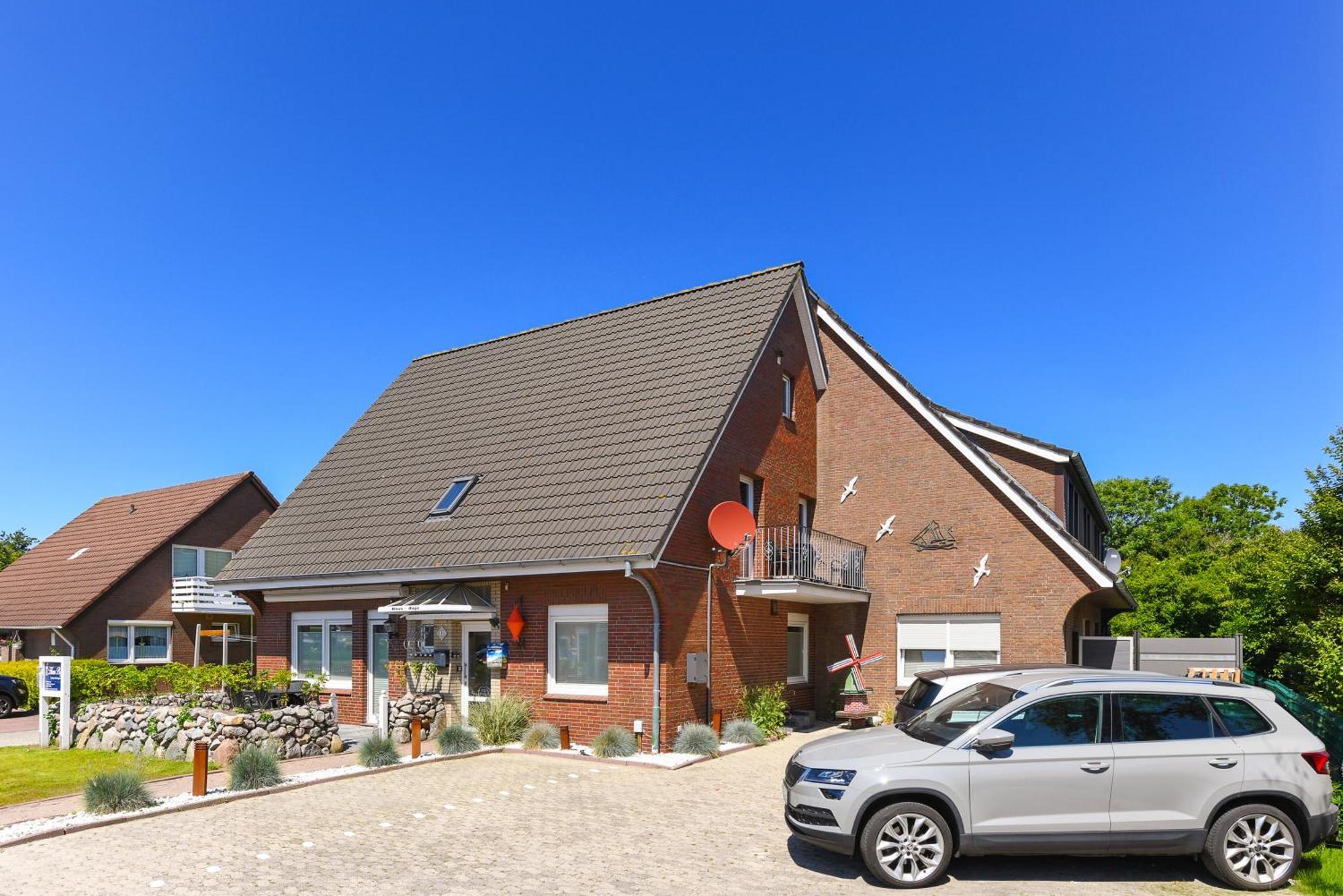 Ferienwohnung Haus Boje "Knurrhahn" Neuharlingersiel Buitenkant foto